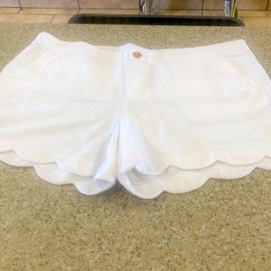 These are Lily  Pulitzer butter cup shorts in a size sixteen .